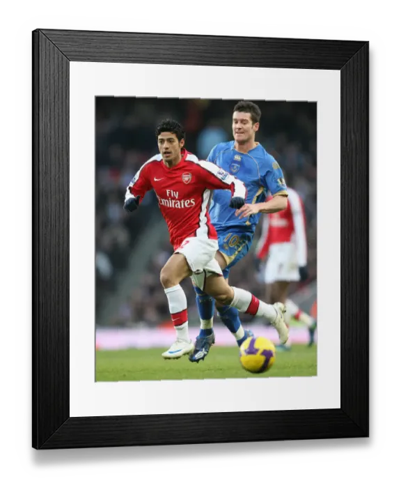 Framed Print : Carlos Vela (Arsenal) David Nugent (Portsmouth) Framed Print : Carlos Vela (Arsenal) David Nugent (Portsmouth)