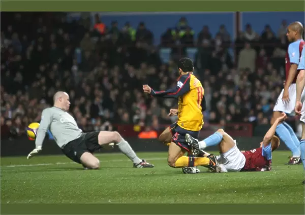Denilson shoots past Aston Villa goalkeeper Brad Friedel