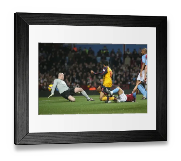 Framed Print : Denilson shoots past Aston Villa goalkeeper Brad Friedel Framed Print : Denilson shoots past Aston Villa goalkeeper Brad Friedel