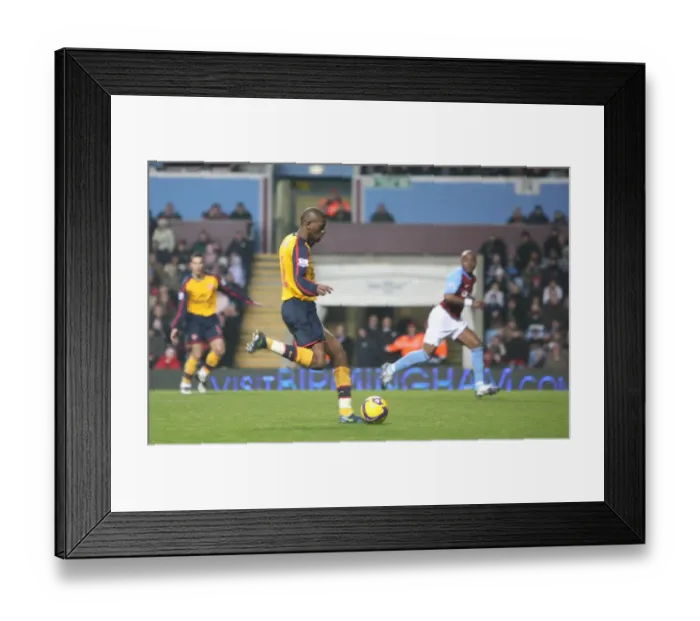 Framed Print : Abou Diaby shoots past Aston Villa goalkeeper Brad