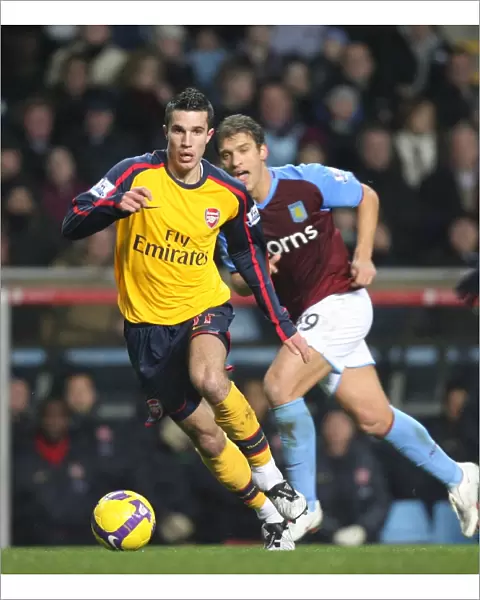 Robin van Persie (Arsenal) Stiliyan Petrov (Aston Villa)
