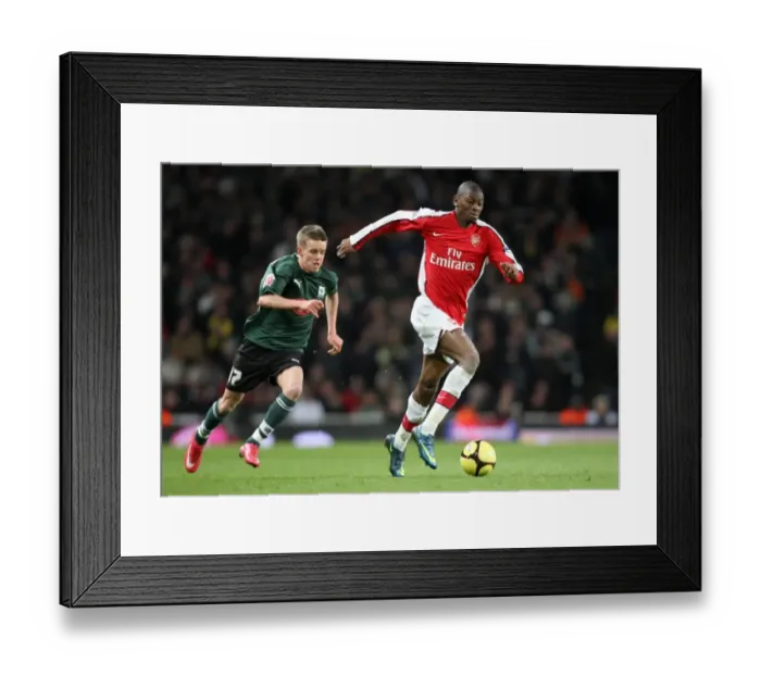 Framed Print : Abou Diaby and Craig Noone Clash in FA Cup: Arsenal's 3:1 Victory over Plymouth Argyle at Emirates Stadium (January 3, 2009) Framed Print : Abou Diaby and Craig Noone Clash in FA Cup: Arsenal's 3:1 Victory over Plymouth Argyle at Emirates Stadium (January 3, 2009)