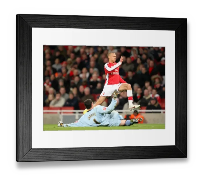 Framed Print : Kieran Gibbs (Arsenal) Romain Larrieu (Plymouth) Framed Print : Kieran Gibbs (Arsenal) Romain Larrieu (Plymouth)