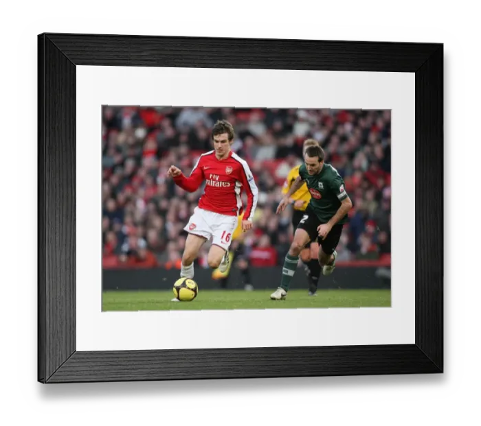 Framed Print : Aaron Ramsey (Arsenal) Karl Duguid (Plymouth) Framed Print : Aaron Ramsey (Arsenal) Karl Duguid (Plymouth)