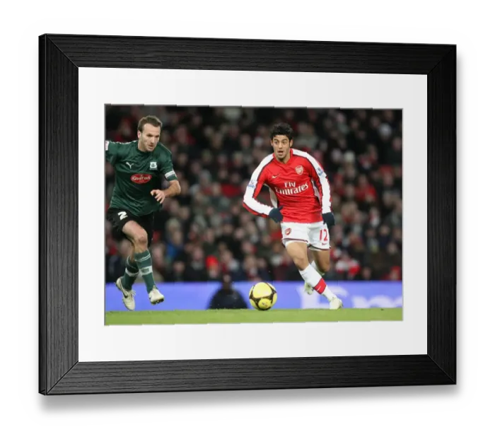 Framed Print : Carlos Vela (Arsenal) Karl Duguid (Plymouth) Framed Print : Carlos Vela (Arsenal) Karl Duguid (Plymouth)