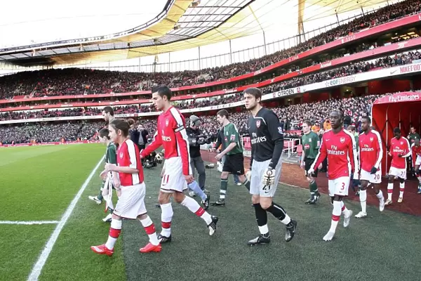 Arsenal captain Robin van Persie leads out the team