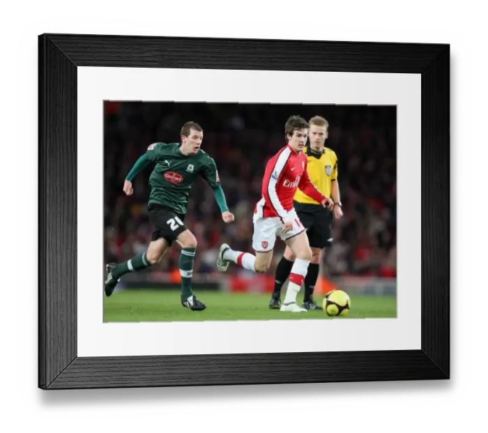 Framed Print : Aaron Ramsey Scores the Winning Goal: Arsenal Triumphs 3-1 over Plymouth Argyle in FA Cup Third Round