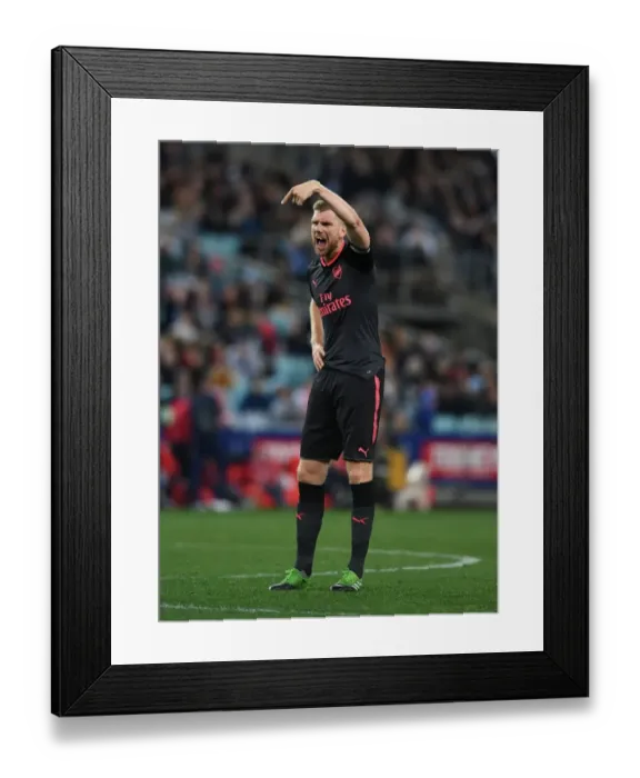 Framed Print : Per Mertesacker in Action: Arsenal vs. Sydney FC (2017)
