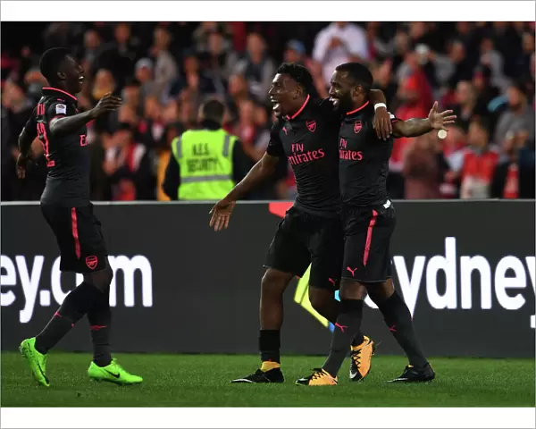 Arsenal's Lacazette, Iwobi, and Nketiah Celebrate Goals Against Sydney FC