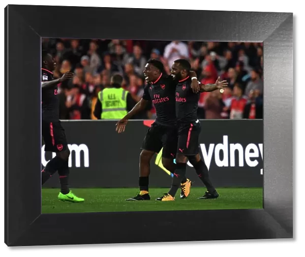 Arsenal's Lacazette, Iwobi, and Nketiah Celebrate Goals Against Sydney FC
