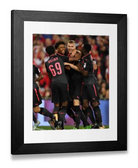 Framed Print : Arsenal's Pre-Season Victory: Mertesacker, Nelson, Willock, and Welbeck Score in Sydney FC Clash (2017-18)