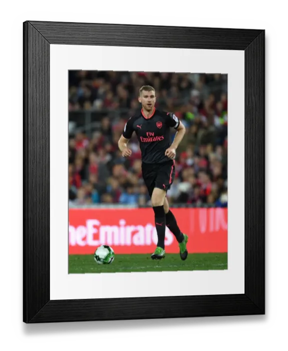 Framed Print : Per Mertesacker in Action: Arsenal's Pre-Season Clash against Sydney FC (2017)