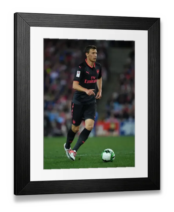 Framed Print : Arsenal's Krystian Bielik in Action against Sydney FC (2017)