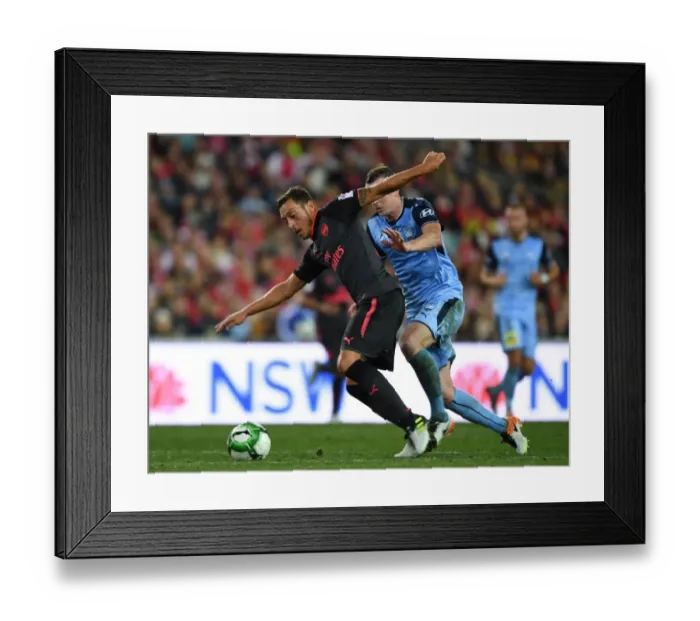 Framed Print : Mesut Ozil vs Brandon O'Neill: Sydney FC vs Arsenal Pre-Season Clash Framed Print : Mesut Ozil vs Brandon O'Neill: Sydney FC vs Arsenal Pre-Season Clash
