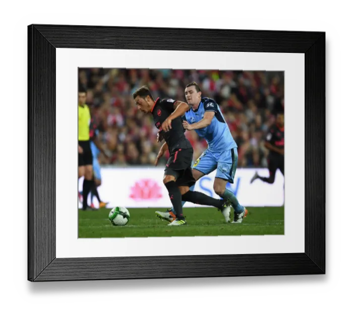 Framed Print : Clash of Talents: Mesut Ozil vs Brandon O'Neill - Sydney FC vs Arsenal Pre-Season Match Framed Print : Clash of Talents: Mesut Ozil vs Brandon O'Neill - Sydney FC vs Arsenal Pre-Season Match