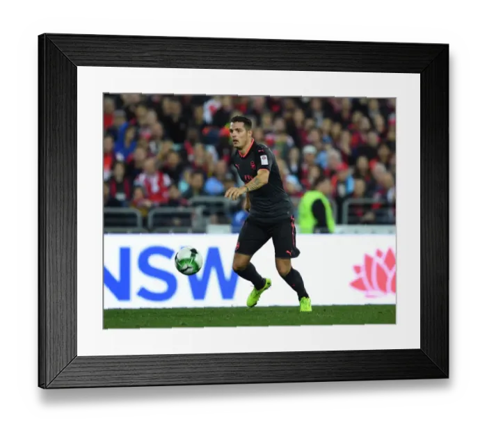 Framed Print : Granit Xhaka in Action: Arsenal's Pre-Season Clash with Sydney FC (2017)