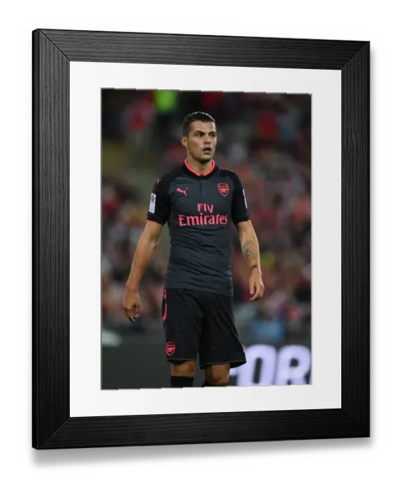 Framed Print : Granit Xhaka: In Action for Arsenal Against Sydney FC (2017) Framed Print : Granit Xhaka: In Action for Arsenal Against Sydney FC (2017)