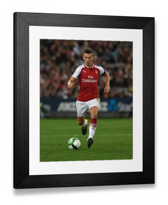 Framed Print : Arsenal's Koscielny in Action: Sydney Western Wanderers vs Arsenal (2017-18)
