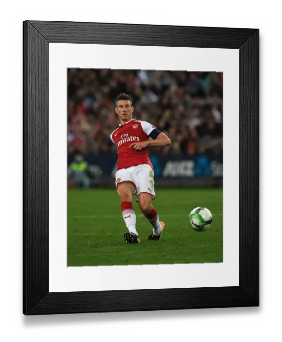 Framed Print : Arsenal's Laurent Koscielny in Action Against Sydney Western Wanderers