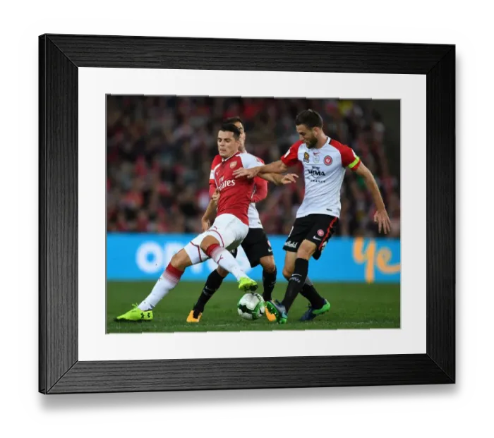 Framed Print : Granit Xhaka vs. Robert Cornthwaite: Clash of the Midfielders (Sydney Wanderers vs. Arsenal, 2017)
