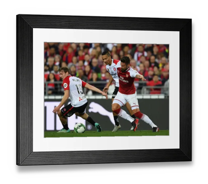 Framed Print : Giroud vs. Melling: A Football Battle - Arsenal's Olivier Giroud Clashes with Sydney Wanderers Jacob Melling Framed Print : Giroud vs. Melling: A Football Battle - Arsenal's Olivier Giroud Clashes with Sydney Wanderers Jacob Melling