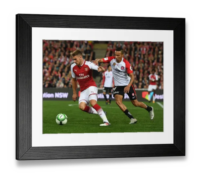 Framed Print : Aaron Ramsey vs. Brendan Hamill: Clash of the Midfielders - Arsenal vs. Western Sydney Wanderers Framed Print : Aaron Ramsey vs. Brendan Hamill: Clash of the Midfielders - Arsenal vs. Western Sydney Wanderers