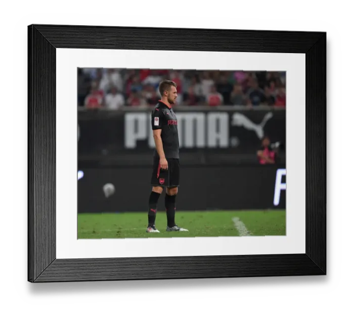 Framed Print : Arsenal's Aaron Ramsey in Action against Bayern Munich in Shanghai Pre-Season Friendly (2017) Framed Print : Arsenal's Aaron Ramsey in Action against Bayern Munich in Shanghai Pre-Season Friendly (2017)