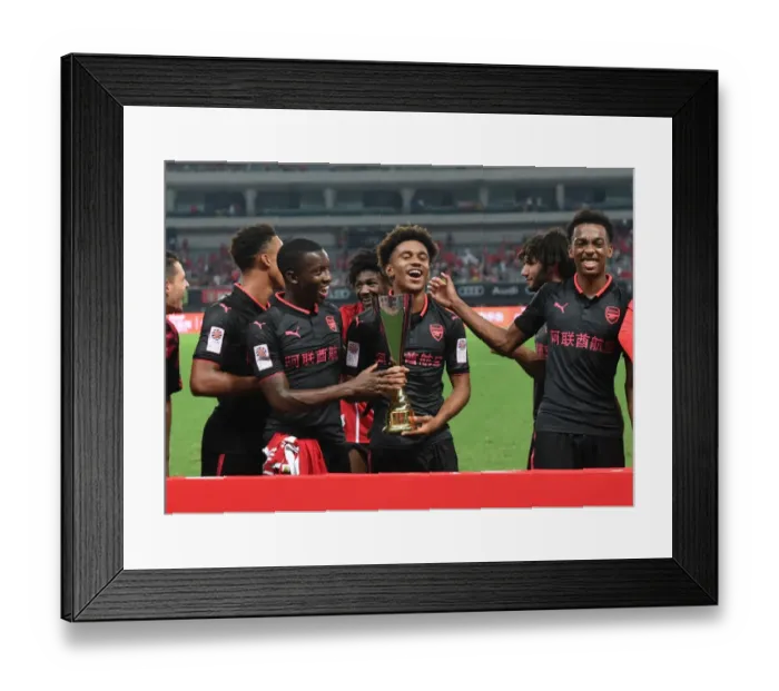 Framed Print : Arsenal's Rising Stars: Reiss Nelson, Joe Willock, and Eddie Nketiah in Action against Bayern Munich (2017-18)
