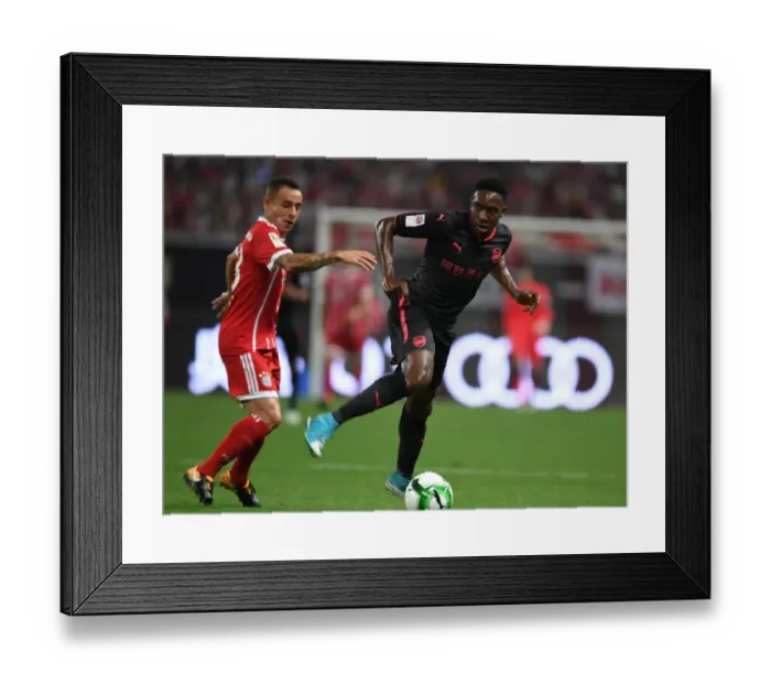 Framed Print : Welbeck vs Rafinha: Arsenal vs Bayern Munich Pre-Season Showdown in Shanghai
