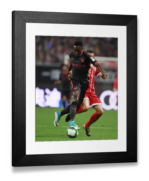 Framed Print : Danny Welbeck vs. Rafinha: Battle in Shanghai - Bayern Munich vs. Arsenal Pre-Season Clash