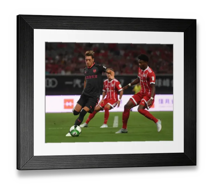 Framed Print : Mesut Ozil Outmaneuvers David Alaba: Bayern Munich vs. Arsenal Pre-Season Clash