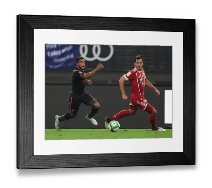 Framed Print : Clash of Titans: Theo Walcott vs. Mats Hummels - Bayern Munich vs. Arsenal Pre-Season Friendly Framed Print : Clash of Titans: Theo Walcott vs. Mats Hummels - Bayern Munich vs. Arsenal Pre-Season Friendly