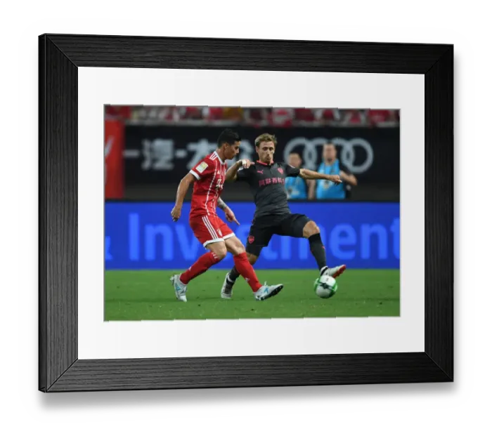 Framed Print : Monreal vs Rodriguez: A Football Rivalry Erupts - Arsenal vs Bayern Munich