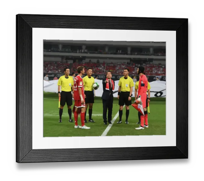 Framed Print : Arsenal vs. Bayern Munich: Pre-Season Friendly - Cech and Muller Lead Teams Out