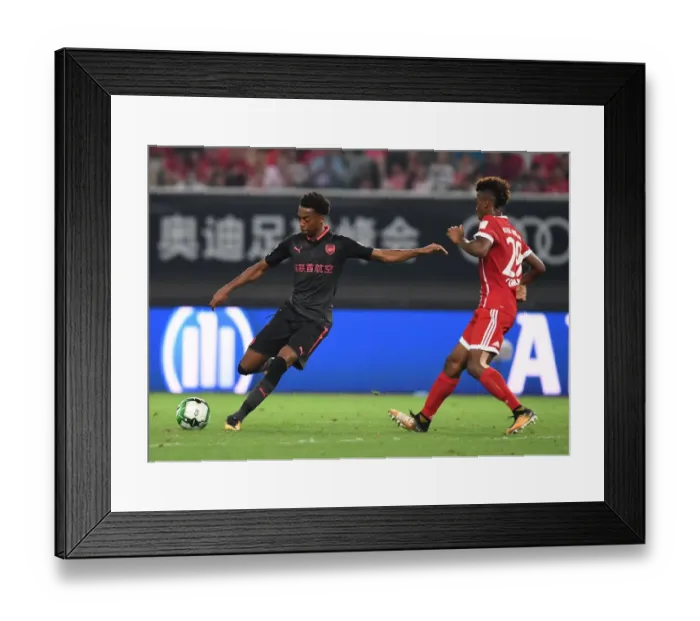 Framed Print : Joe Willock vs. Kingsley Coman: Battle in Shanghai - Bayern Munich vs. Arsenal Pre-Season Clash