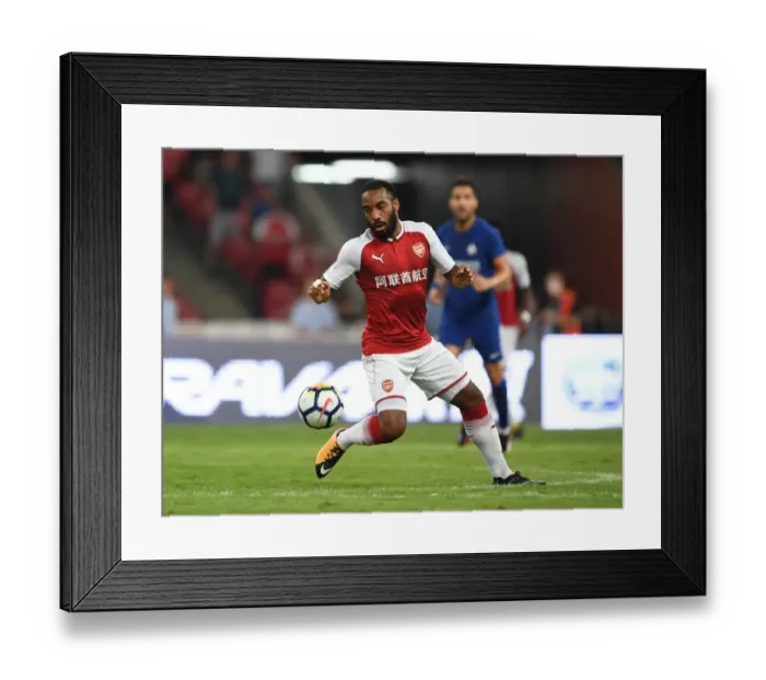 Framed Print : Arsenal's Alexandre Lacazette Goes Head-to-Head Against Chelsea in Beijing Pre-Season Clash
