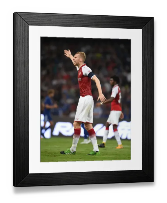 Framed Print : Per Mertesacker in Action: Arsenal vs Chelsea, Beijing 2017 - Pre-Season Clash