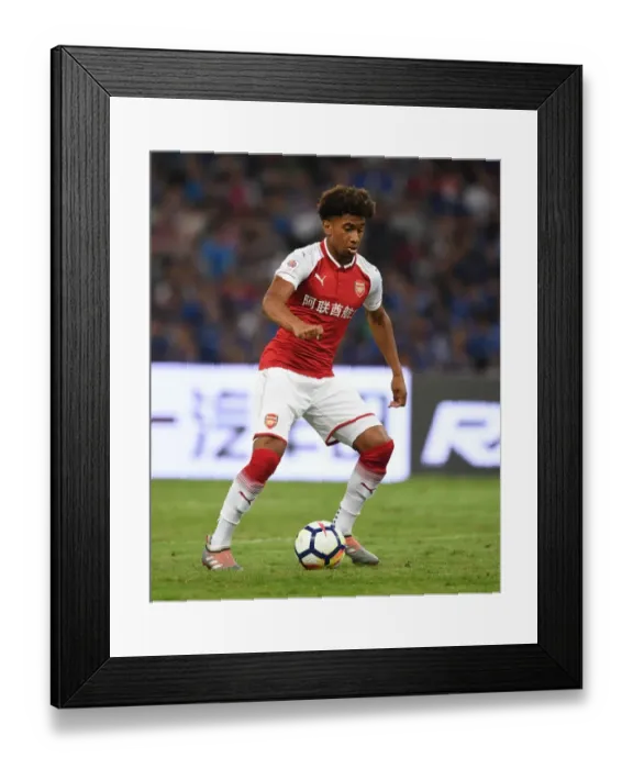 Framed Print : Arsenal's Reiss Nelson Faces Off Against Chelsea in Beijing Pre-Season Friendly