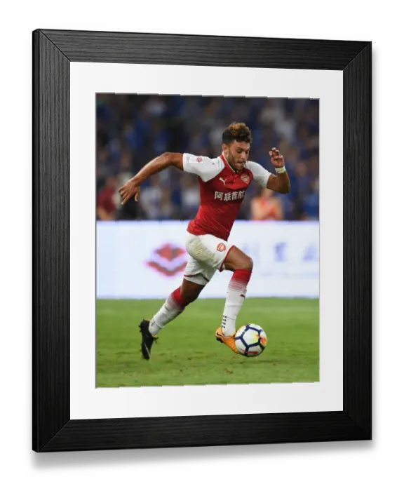 Framed Print : Arsenal's Alex Oxlade-Chamberlain Goes Head-to-Head Against Chelsea in Beijing Pre-Season Clash