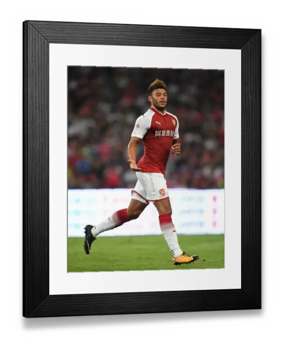 Framed Print : Arsenal's Alex Oxlade-Chamberlain Goes Head-to-Head with Chelsea in Beijing Pre-Season Clash