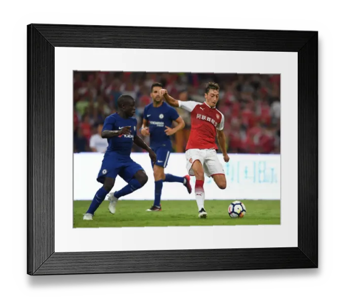 Framed Print : Clash of Midfield Titans: Ozil vs. Kante - Arsenal vs. Chelsea Pre-Season 2017-18