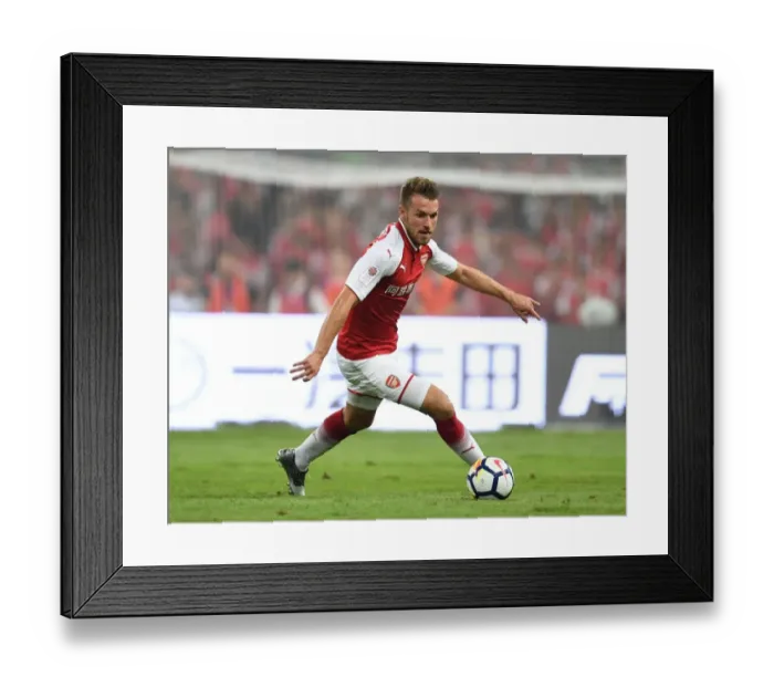 Framed Print : Arsenal's Aaron Ramsey Goes Head-to-Head Against Chelsea in Beijing Pre-Season Clash Framed Print : Arsenal's Aaron Ramsey Goes Head-to-Head Against Chelsea in Beijing Pre-Season Clash