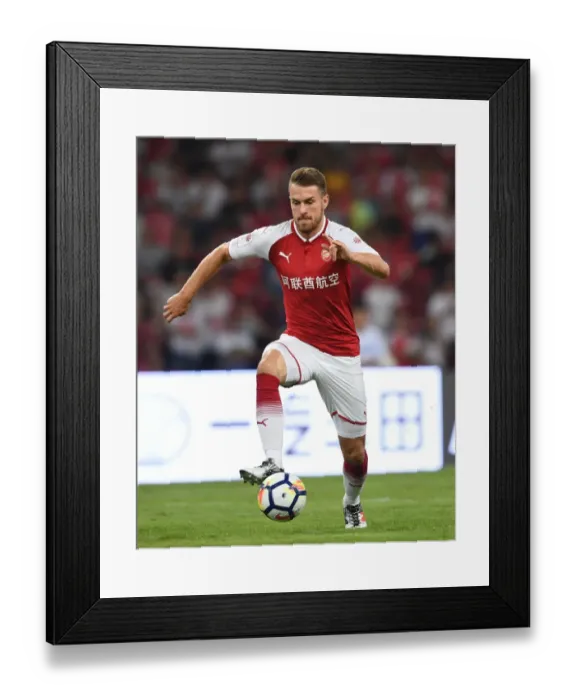 Framed Print : Arsenal's Aaron Ramsey Clashes with Chelsea in Beijing: Pre-Season Showdown Framed Print : Arsenal's Aaron Ramsey Clashes with Chelsea in Beijing: Pre-Season Showdown