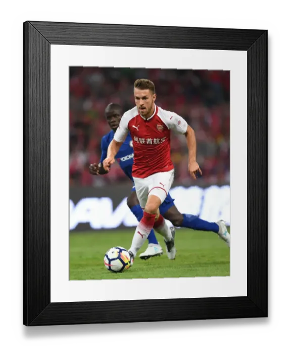 Framed Print : Arsenal's Aaron Ramsey Faces Off Against Chelsea in Beijing Pre-Season Friendly Framed Print : Arsenal's Aaron Ramsey Faces Off Against Chelsea in Beijing Pre-Season Friendly