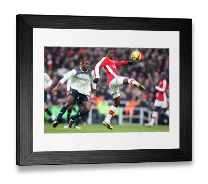Framed Print : Arsenal's Eboue and Muamba Clash in Intense Rivalry: Arsenal 1:0 Bolton, Barclays Premier League, Emirates Stadium (10 / 1 / 09) Framed Print : Arsenal's Eboue and Muamba Clash in Intense Rivalry: Arsenal 1:0 Bolton, Barclays Premier League, Emirates Stadium (10 / 1 / 09)