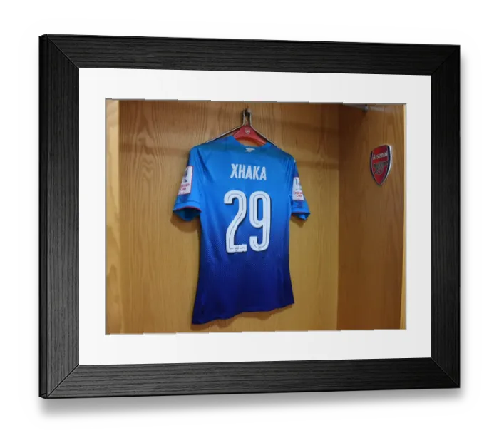 Framed Print : Arsenal FC: Granit Xhaka's Emirates Cup Jersey in the Changing Room