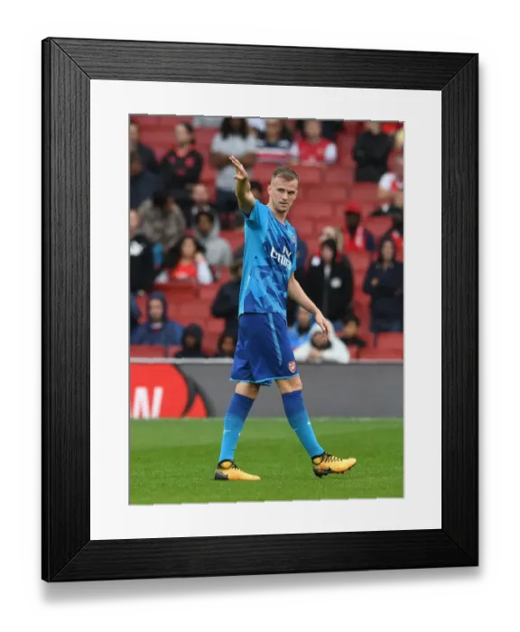 Framed Print : Arsenal's Rob Holding Gears Up for Arsenal v Benfica at Emirates Cup Framed Print : Arsenal's Rob Holding Gears Up for Arsenal v Benfica at Emirates Cup
