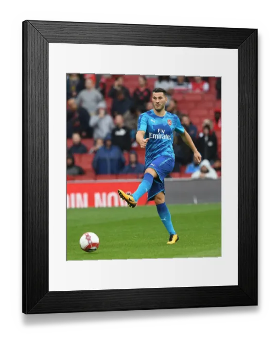 Framed Print : Arsenal's Sead Kolasinac Gears Up for Arsenal v Benfica at Emirates Cup