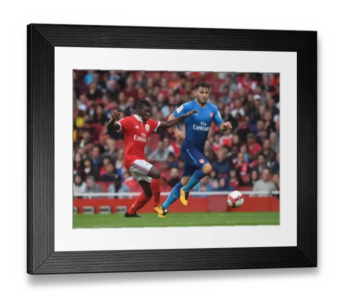 Framed Print : Arsenal's Sead Kolasinac Clashes with Benfica's Buta in Emirates Cup Showdown Framed Print : Arsenal's Sead Kolasinac Clashes with Benfica's Buta in Emirates Cup Showdown