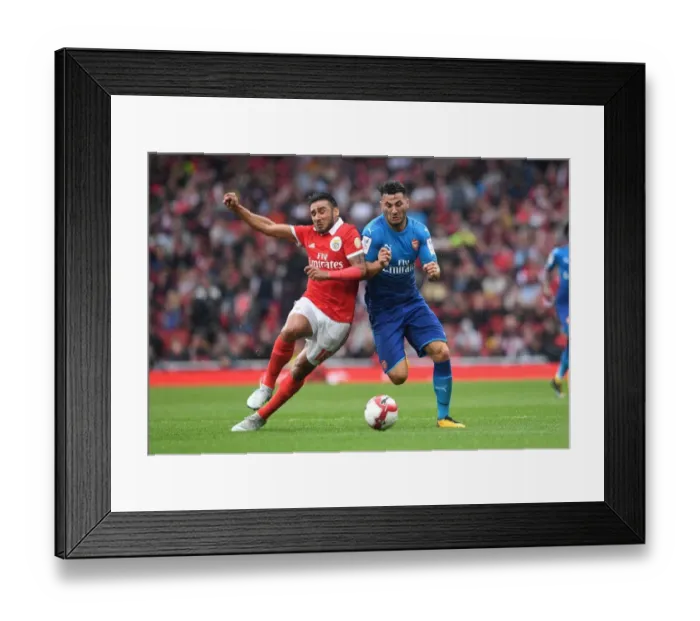 Framed Print : Clash of Titans: Sead Kolasinac vs. Salvio in Intense Arsenal vs. Benfica Emirates Cup Showdown